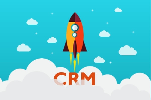 A rocket ship taking off with the letters crm underneath